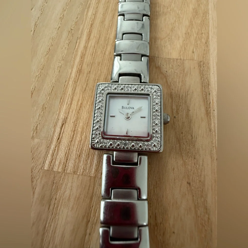 Dainty Bulova ladies square silver tone watch NEW BATTERY